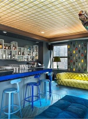 Chaises Nicolle's metal chairs at Chicago's Virgin Hotel bar by Paola Navone
