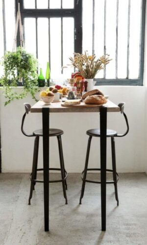 Genuine Nicolle metal chair measuring 75-cm in height, paired with a Tiptoe table. Perfect combination of style and durability from Chaises Nicolle.