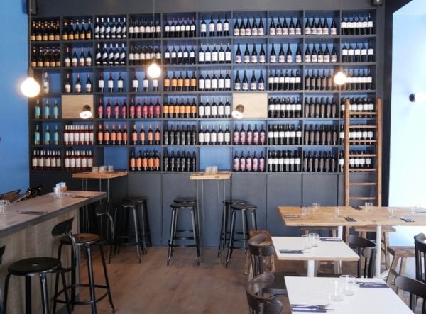 Black industrial metal Nicolle stool with a height of 75-cm. Nicolle stools and chairs at Classico Argentino in Bordeaux.