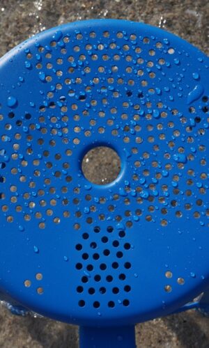 Outdoor chair Nicolle H60-cm - Outdoor chair for the beach by the sea with waves. Comfortable seat with Nicolle's perforated metal design. Perfect for relaxing and enjoying the view.