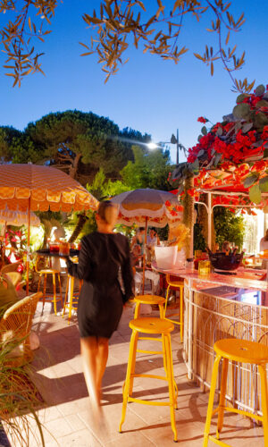 Yellow perforated metal outdoor chair by Chaises Nicolle.